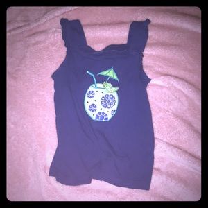 A navy blue shirt for kids with decoration.